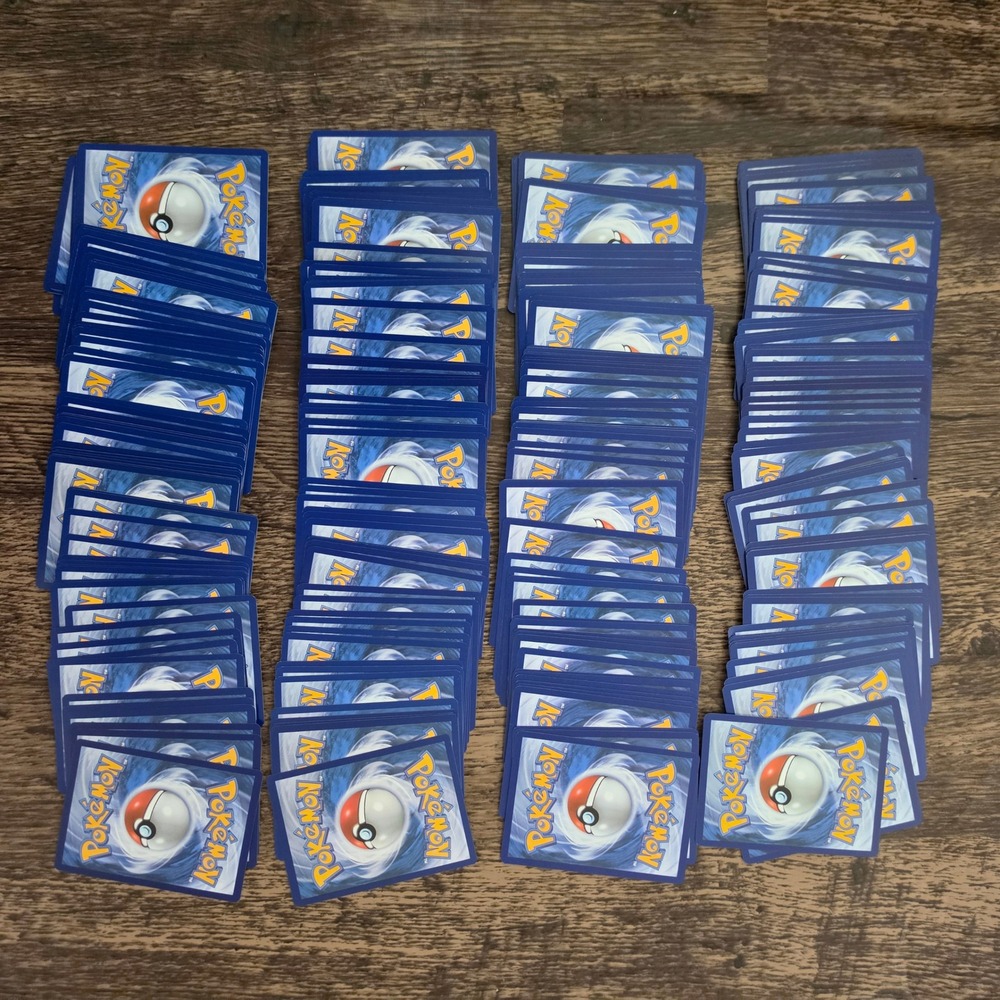 300+ POKEMON bulk cards Including 20 holographic/reverse holo cards